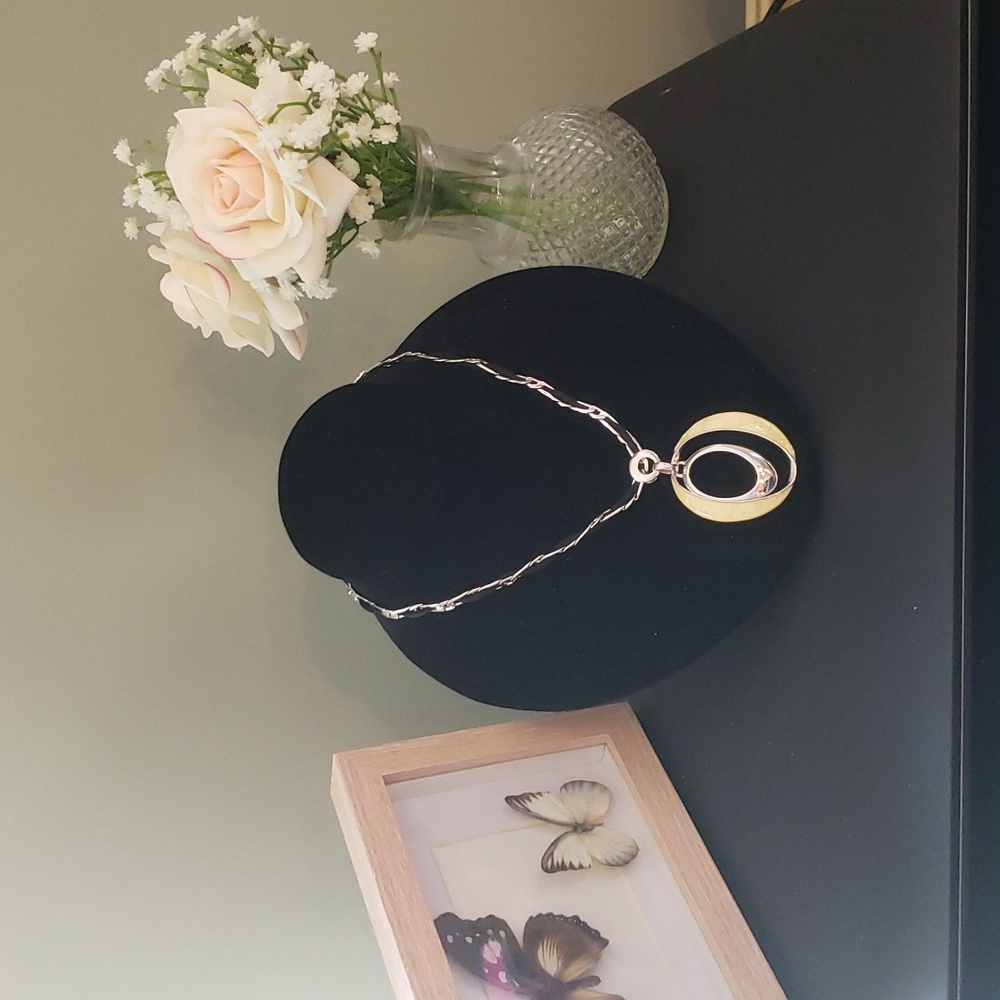 Blackcord and Silvertone necklace with mother of pearl